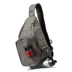 A gray Orvis sling pack designed for fly-fishing, featuring multiple storage compartments and oa water bottle holder.