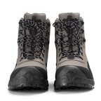 Front view of grat Orvis fishing boots with black soles on a white background