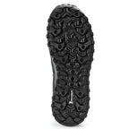 Close-up of a black hiking boot sole with tread pattern on a white background