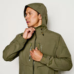 A green Orvis Clearwater Wading Jacket with a hood, featuring a zippered front closure and multiple pockets.
