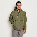 A green Orvis Clearwater Wading Jacket with a hood, featuring a zippered front closure and multiple pockets.