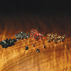 Hareline Brass Cone Heads of various sizes and colors.