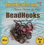A pack of TroutBeads BeadHooks, with the image depicting several black fishing hooks on a background featuring water and beads, suggestive of the product's use in fly fishing.
