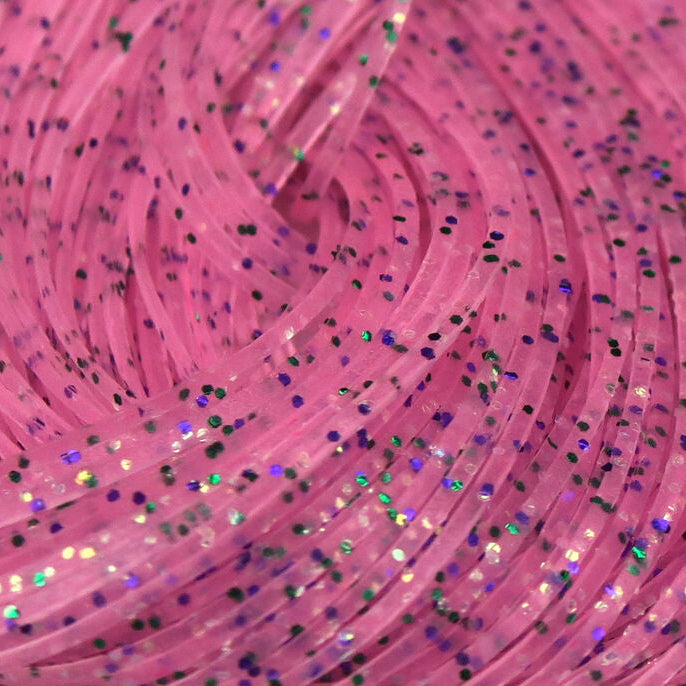 Close-up of pink Hareline Crazy Legs with glittery specks