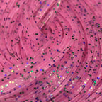 Close-up of pink Hareline Crazy Legs with glittery specks