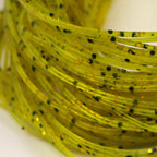 Close-up of yellow Hareline Crazy Legs with black specks on a white background