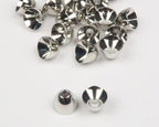 Silver Hareline Brass Cone Heads on a white surface