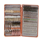 Open Fishpond Tacky Double Haul fly fishing fly box with various types of flies on a light gray background