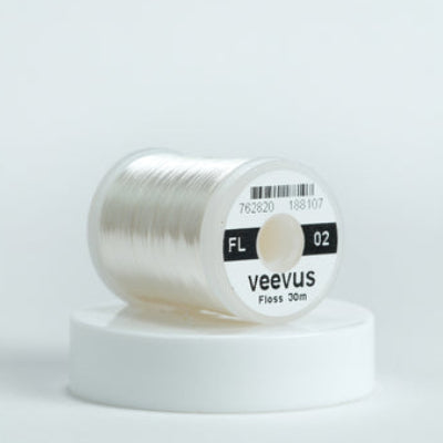 Spool of Veevus floss on a white background