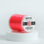 Spool of pink floss thread with 'Veevus' branding on a white background