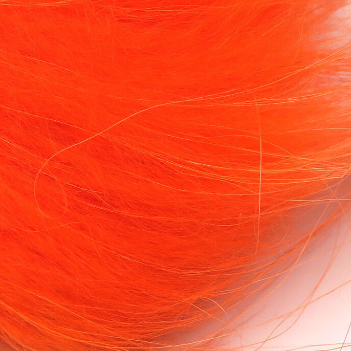 Close-up of bright orange Hareline Finn Raccoon Zonker