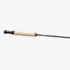 Close-up of a Sage ESN fly fishing rod with black ice thread wraps and a light colored handle.