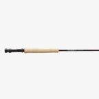 Close-up of a Sage ESN fly fishing rod with black ice thread wraps and a light colored handle.