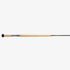 A two-handed Sage Sonic Switch and Spey Fly Rod with a cork handle and a graphite rod body, featuring charcoal and gunmetal trim wraps.