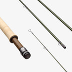 A Sage Sonic fishing rod with green shafts and beige handles