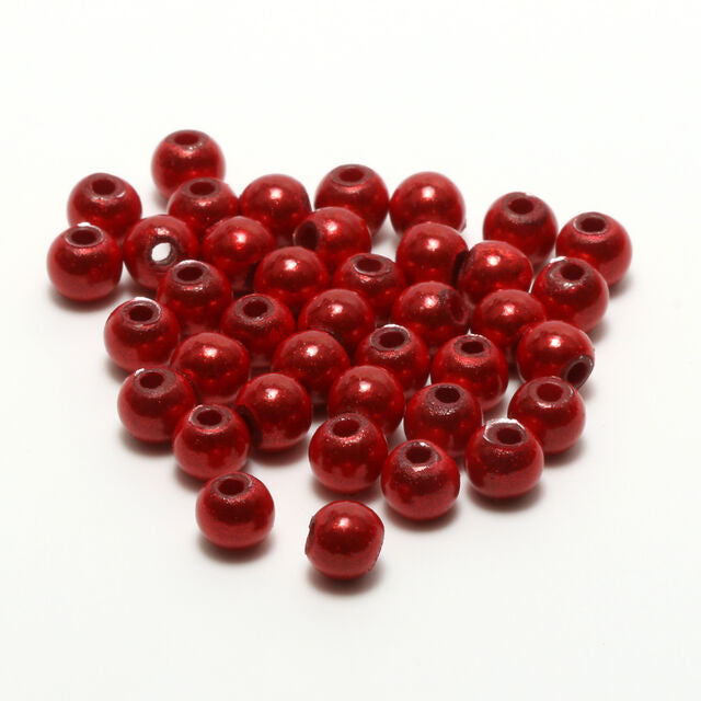 Red Hareline 3D Beads on a white background