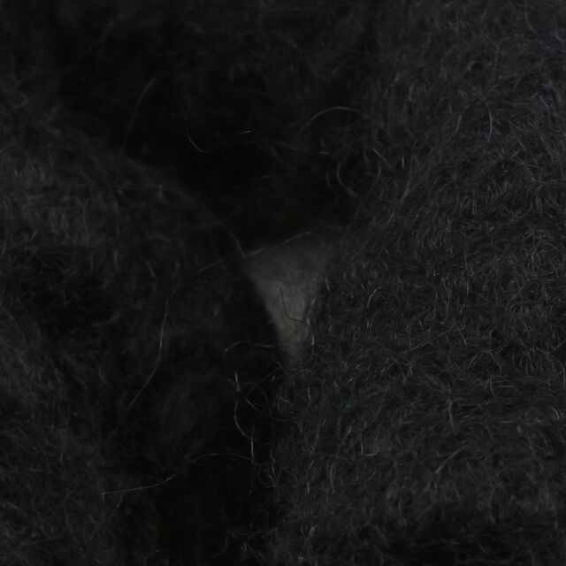 Close-up of Wapsi Sculpin Wool with a visible texture, likely used for fly tying in fishing.