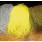 Three balls of Hareline Icelandic Sheep Hair yarn in gray, yellow, and brown on a wooden surface.