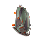 A green Fishpond Thunderhead Submersible Sling Pack with orange accents on a white background.