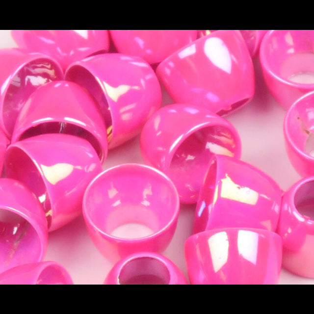 Pink Hareline Tube Cone Heads on a white background
