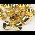 Gold Hareline Tube Cone Heads on a white background