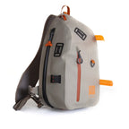 Gray Fishpond Thunderhead Submersible Sling Pack with orange accents on a white background