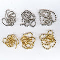 Set of Hareline Bead Chain Eyes in various colors and sizes on a white background