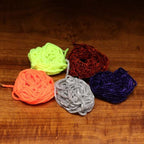 Five balls of Hareline Fine Chenille in green, red, orange, gray, and blue on a wooden surface.