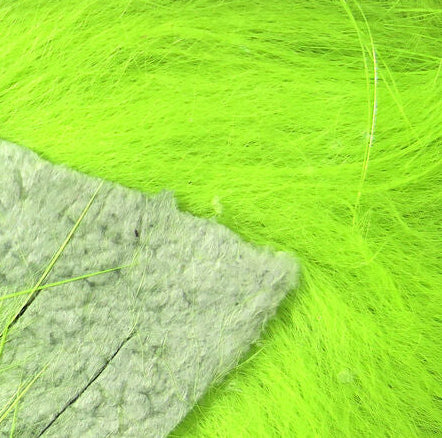 Close-up of bright green Hareline 1/8" Crosscut Rabbit Strips