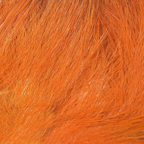 Close-up of orange Hareline 1/8" Crosscut Rabbit Strips