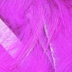 Close-up of pink Hareline 1/8" Crosscut Rabbit Strips