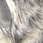 Close-up of gray and black Hareline 1/8" Crosscut Rabbit Strips