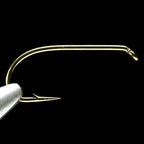A close-up of a single Daiichi 1550 Nymph Hook with a bronze finish, showing the hook point and the wire bend.