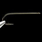A close-up of a single Daiichi 1750 fly fishing hook with a bronze finish.