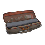 An opened Fishpond Dakota Rod & Reel Case with fishing gear in it. 