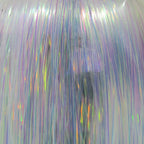 Holographic tinsel with multicolor strands on a blurred background