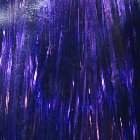 Close-up of purple tinsel against a dark background
