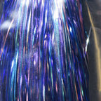 Close-up of blue and purple tinsel strands