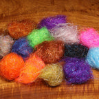 A collection of Hareline Senyo's Fusion Dub fly tying materials in various colors, displayed in three rows with the product labels visible.
