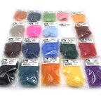 A collection of Hareline Ice Dub packets in various colors for fly tying, presented in rows with clear visibility of each color.