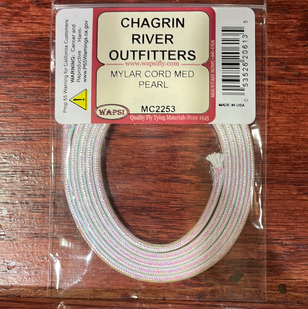 Packaged Wapsi Mylar Cord in pearl color, intended for use in fly tying, with Chagrin River Outfitters branding visible.
