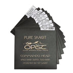 Stack of black boxes with 'Pure Skagit' branding on a white background