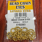 Packaged bead chain eyes for fly tying, available in gold and silver colors, displayed on a fly tying kit card.