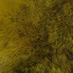 Close-up of a textured green Hareline Zonker Cut Hide