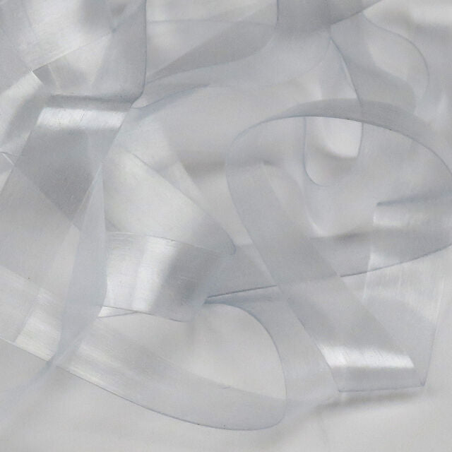 Close-up of translucent Hareline Scud Back 1/8”