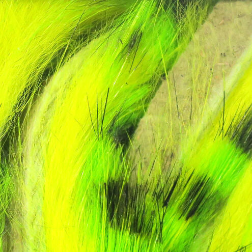 Close-up of bright green Hareline Tiger Barred 1/8” Rabbit Strips