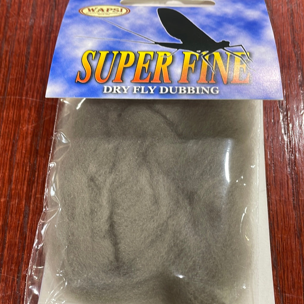 Packaged Wapsi Super Fine Dry Fly Dubbing, visible through a clear plastic front, with a blue and yellow label behind.