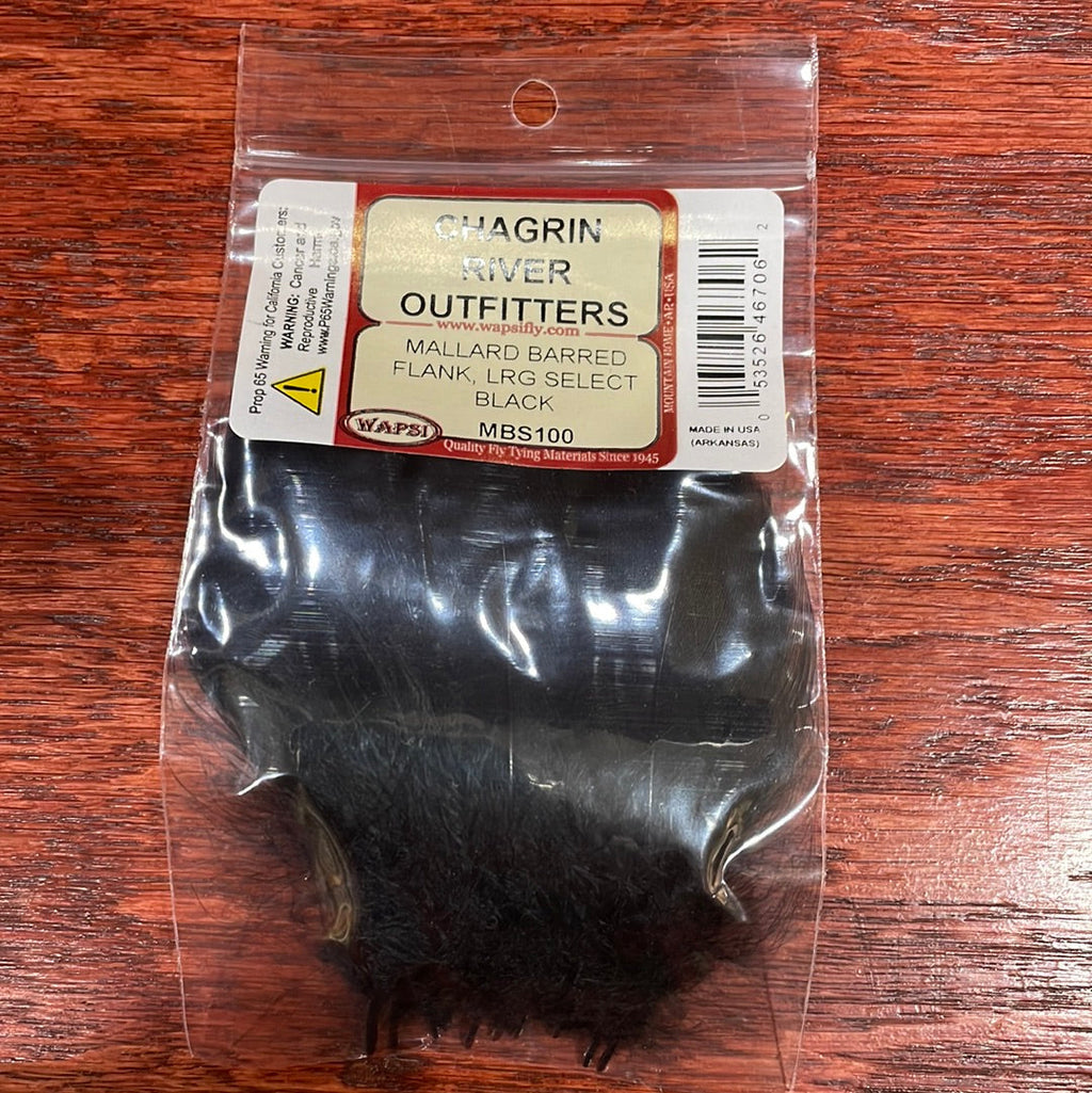 Packaged Wapsi Mallard Barred Flank in black, select size for fly tying, visible through a clear plastic bag with a red and white label.
