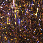 Close-up of Hareline Large Sized UV Polar Chenille with a mix of gold and purple colors.
