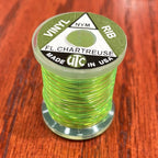 Spool of green Wapsi UTC Vinyl Rib with a visible brand label on a wooden surface